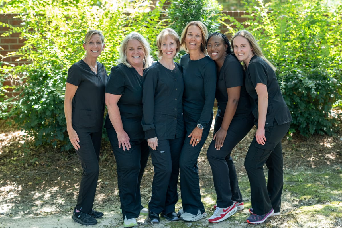 The Advanced Dental Care of Lexington hygienists, assistants, and front-office team outdoors together